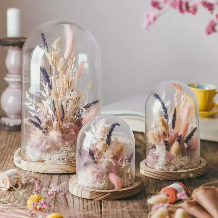 Glass dome with stabilized flowers