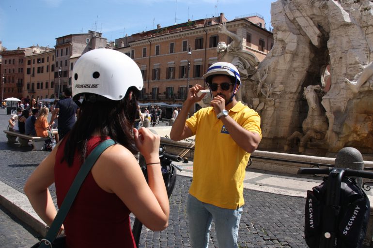 Edie explaining history of Piazza Navona during the Segway tour in Rome