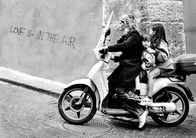 3 on a scooter Naples Italian