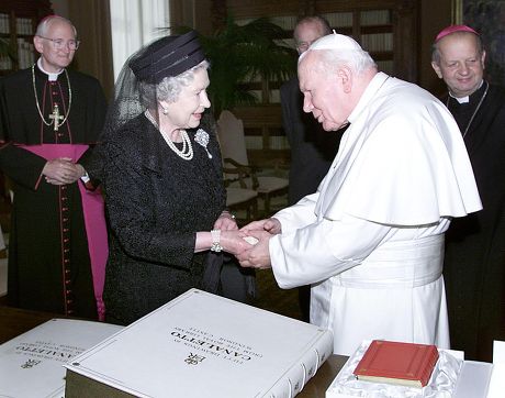 Queen Elizabeth Ii Exchanges Presents With With Pope John Paul Ii During An Audience At The Vatican In Rome Italy Tuesday October 17 2000. Dressed In Black And Wearing A Veil The Queen Was Greeted By The 80-year-old Leader Of The Roman Catholic Churc