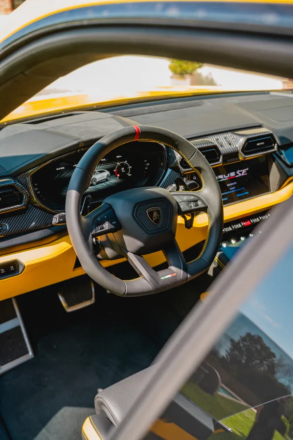 Yellow Lamborghini Urus SE, carbon fiber interior