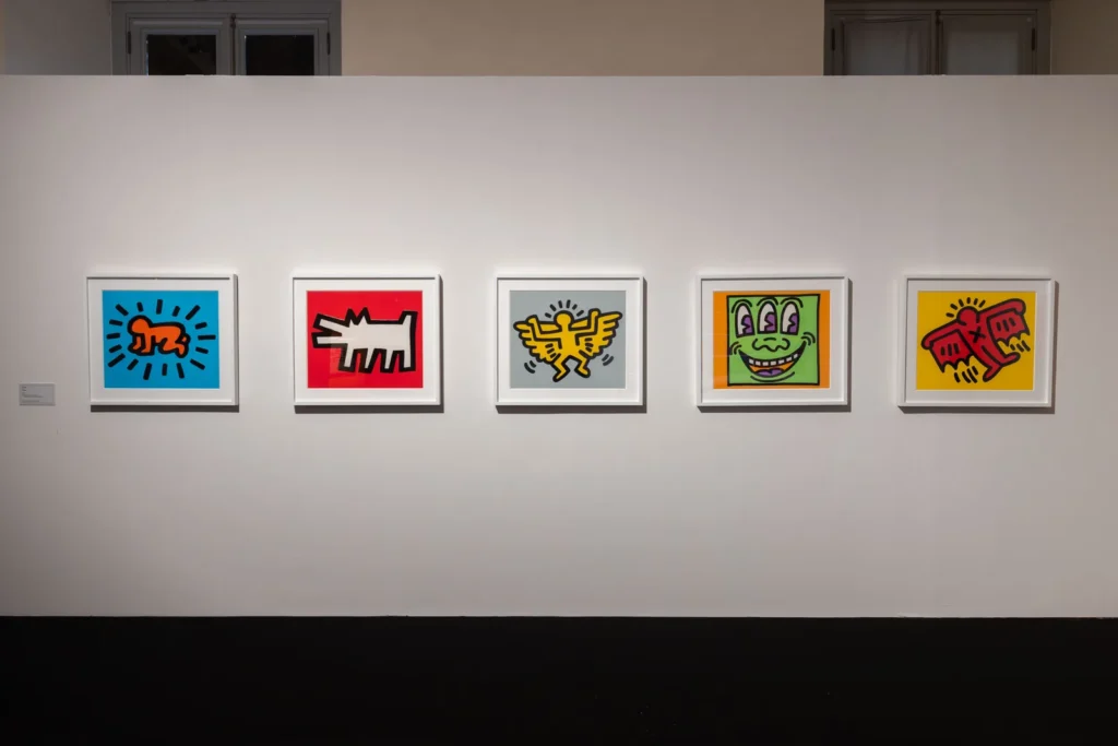 Five prints from Keith Haring's Icons series, including the Radiant Baby and the Barking Dog, at Palazzo Braschi
