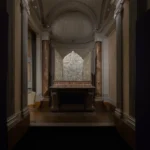 Keith Haring’s Altarpiece: The Life of Christ, a silver triptych displayed in the chapel of Palazzo Braschi