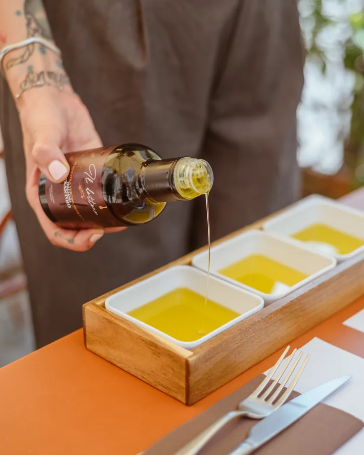 Tasting of three extra virgin olive oils at Osteria Oliva in Rome's Monti district